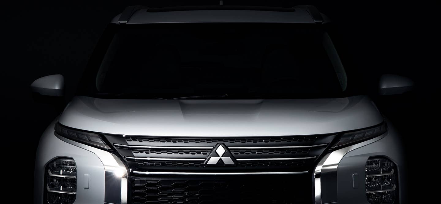 Front view of a white Mitsubishi Outlander SUV