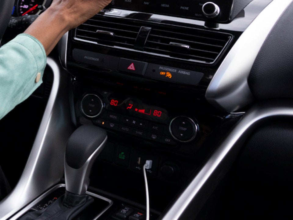 Close up of dual zone climate controls in the 2023 / 2024 Mitsubishi Eclipse Cross Compact SUV