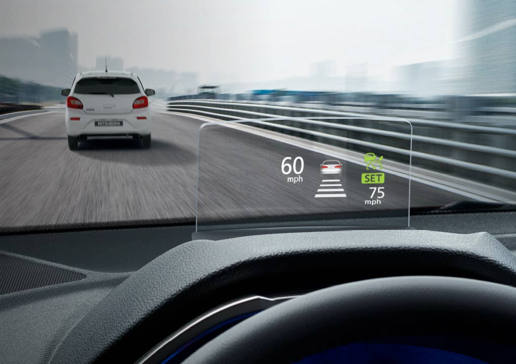 View through the windshield of 2023 / 2024 Mitsubishi Eclipse Cross Compact SUV demonstrating Heads Up Display 