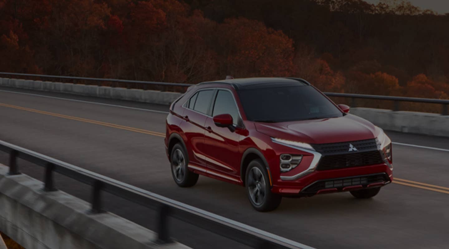 A red 2024 / 2025 Mitsubishi Eclipse Cross Compact SUV  