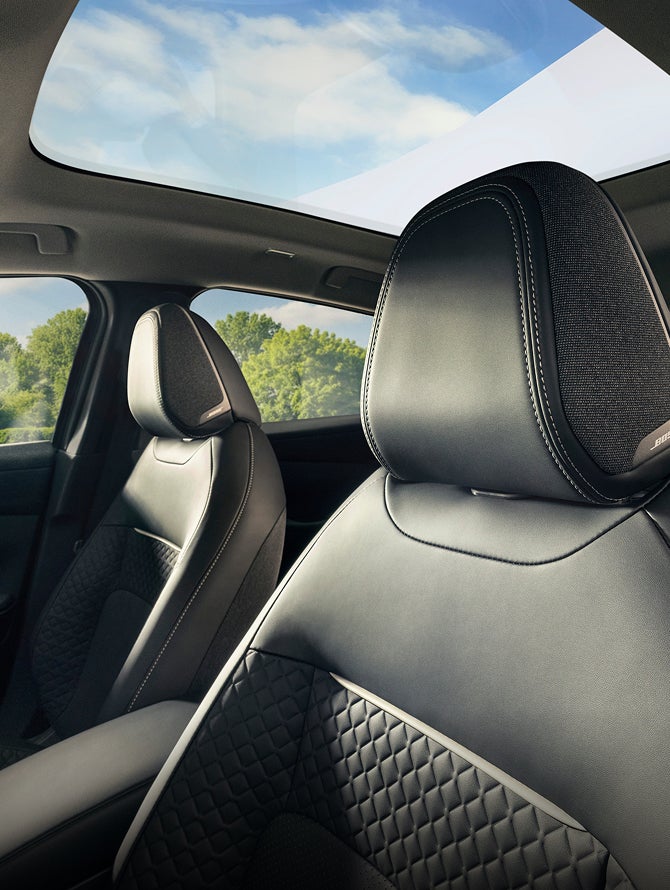 Front seats and panoramic roof in the 2027 Mitsubishi Eclipse Sportback EV.