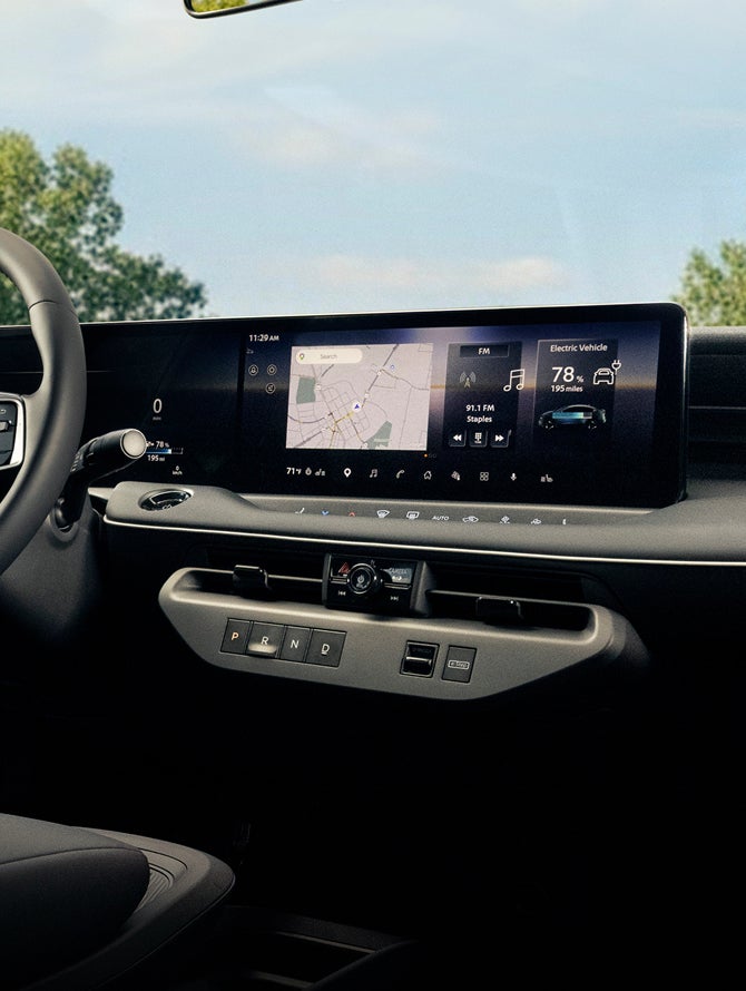 Interior view of the front seats and windshield in the 2027 Mitsubishi Eclipse Sportback EV.