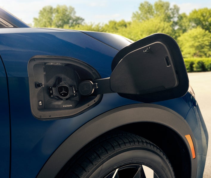 Close-up of the charging port on the 2027 Mitsubishi Eclipse Sportback EV electric SUV.