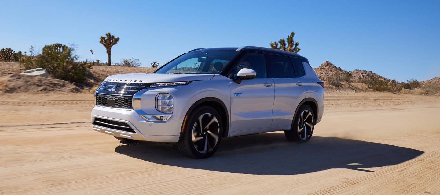 2024 / 2025 Mitsubishi Outlander PHEV SUV driving in the desert