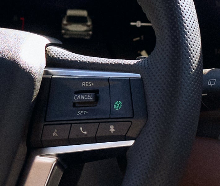 Close up on the control for Traffic Jam Assist in the 2026 Mitsubishi Outlander PHEV SUV