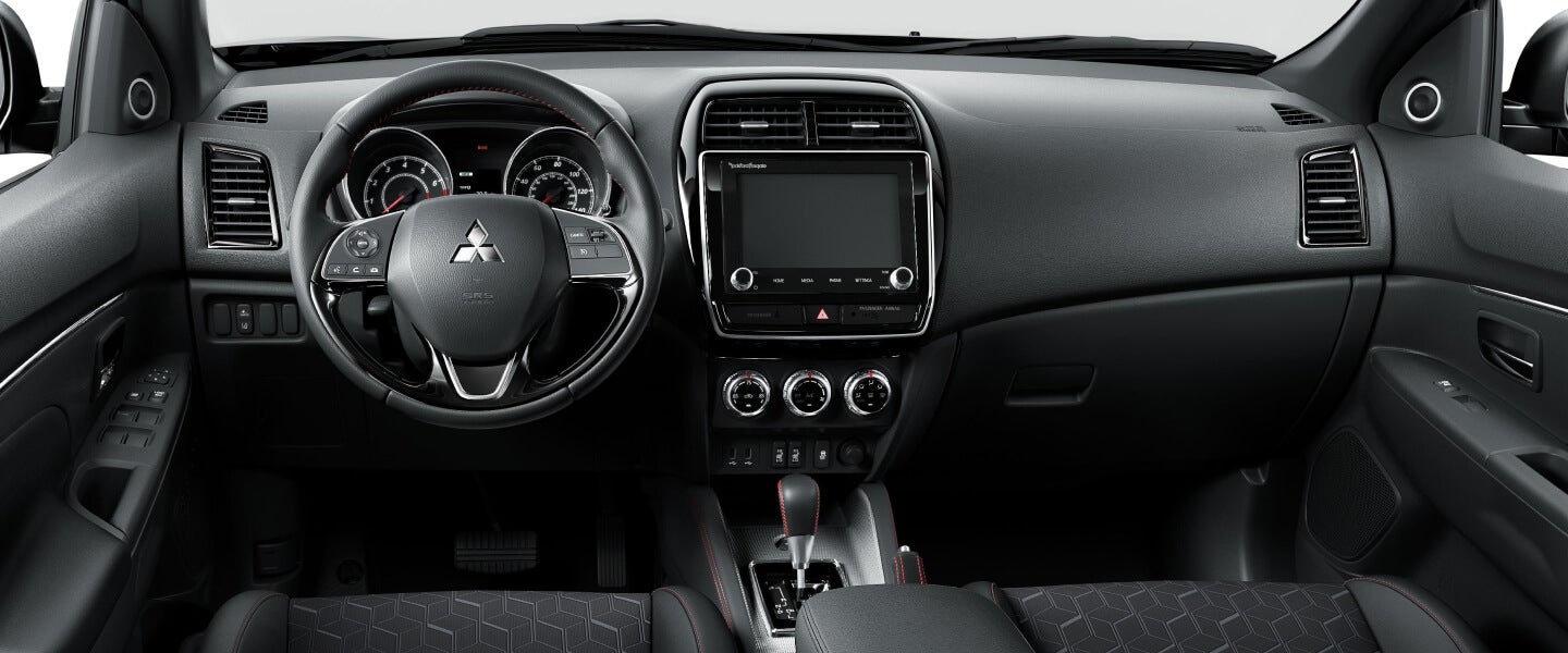 2022 Mitsubishi Outlander Sport driver side black interior and dashboard