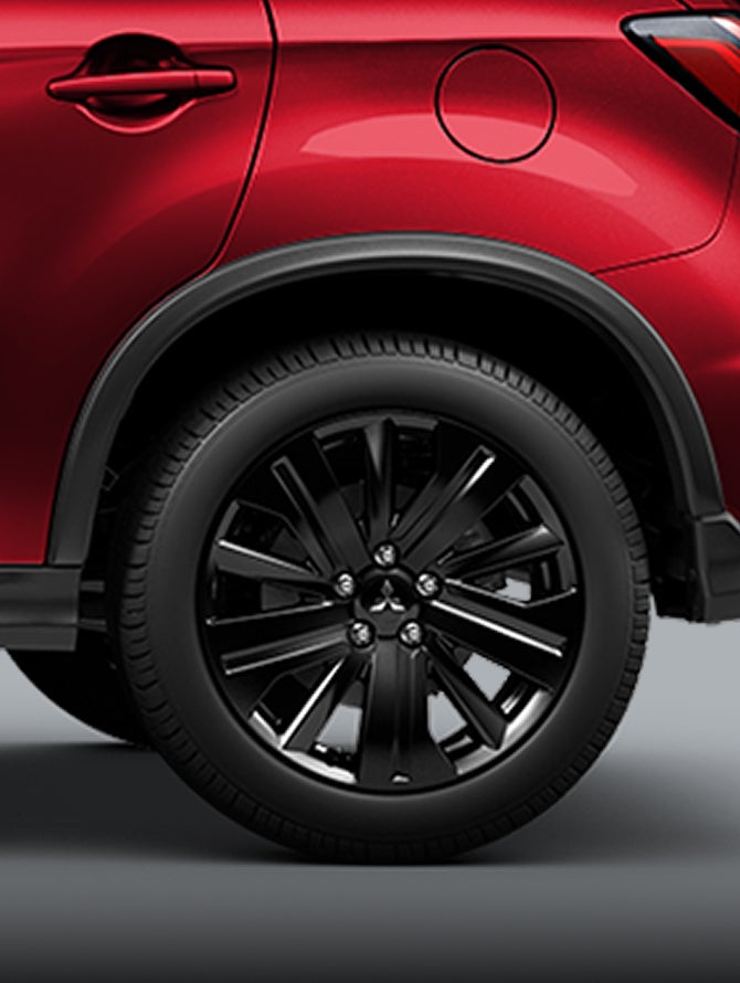 Close up of black 2026 Mitsubishi Outlander Sport SUV tires