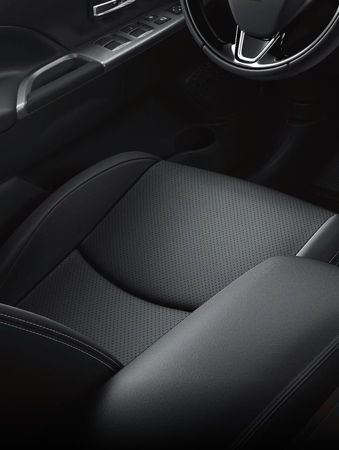 Close up of 2026 Mitsubishi Outlander Sport SUV front leather seats from above