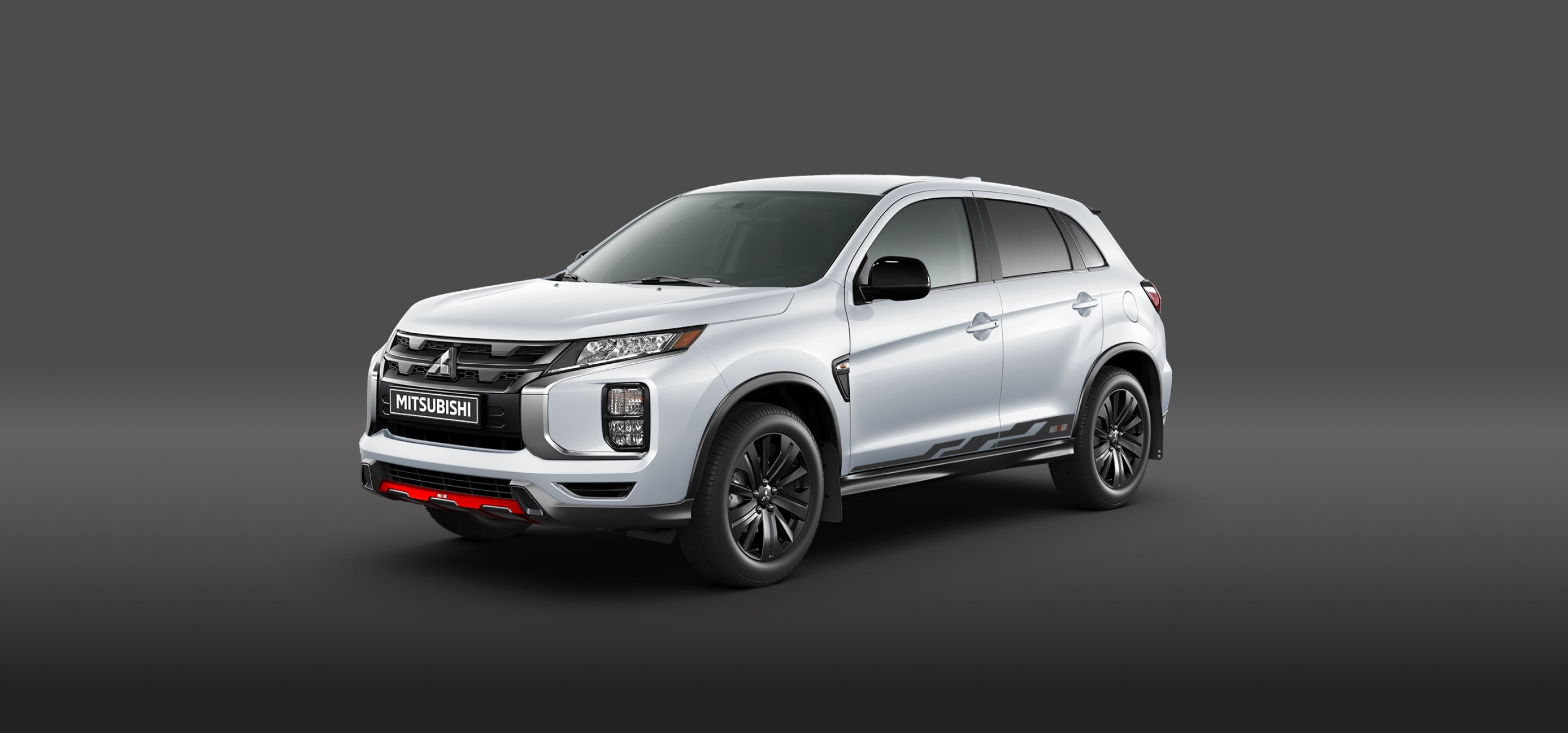 White 2027 Mitsubishi Outlander Sport Railliart on a blank grey background