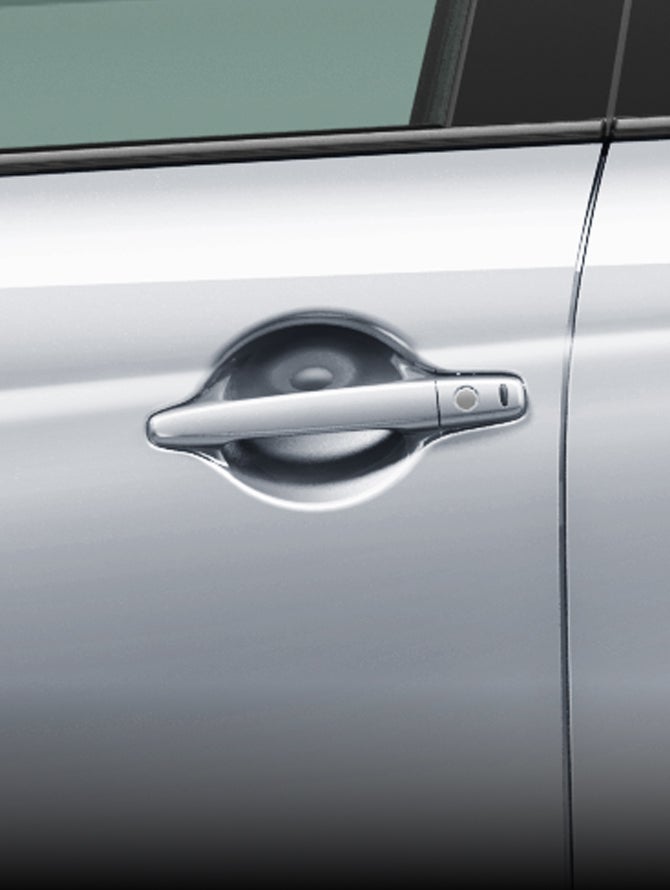 Available fast key entry system displayed on a silver 2027 Mitsubishi Outlander Sport