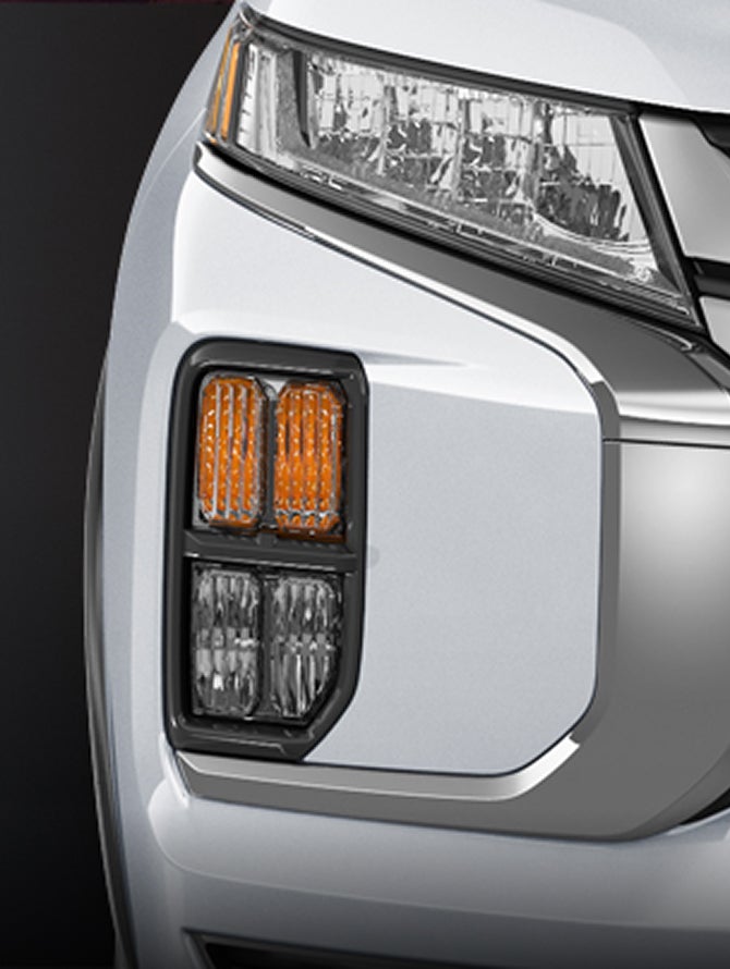 Close up on the available LED headlights and foglights for the 2027 Mitsubishi Outlander Sport