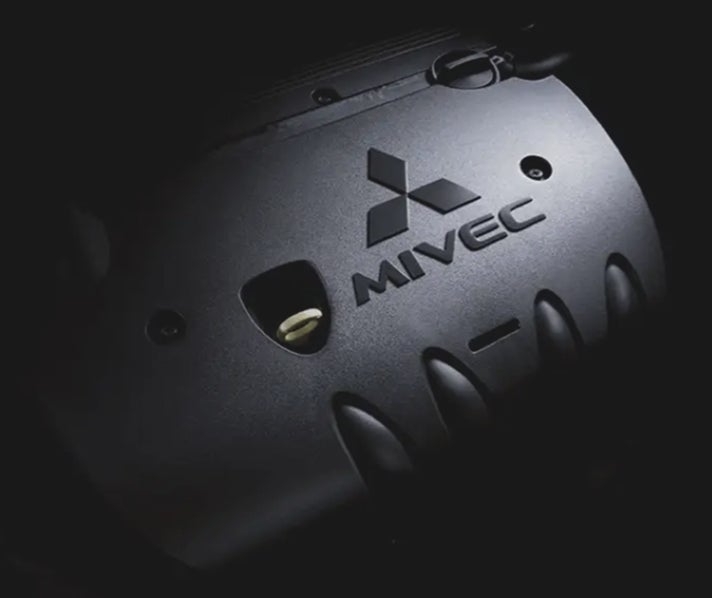 Close up on the MIVEC badge on the engine in the 2027 Mitsubishi Outlander Sport