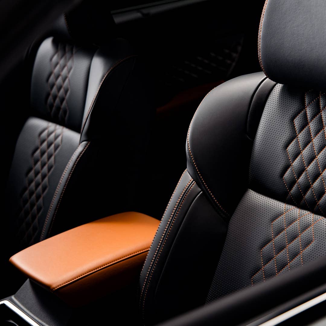 2023 Mitsubishi Outlander SUV black and orange interior