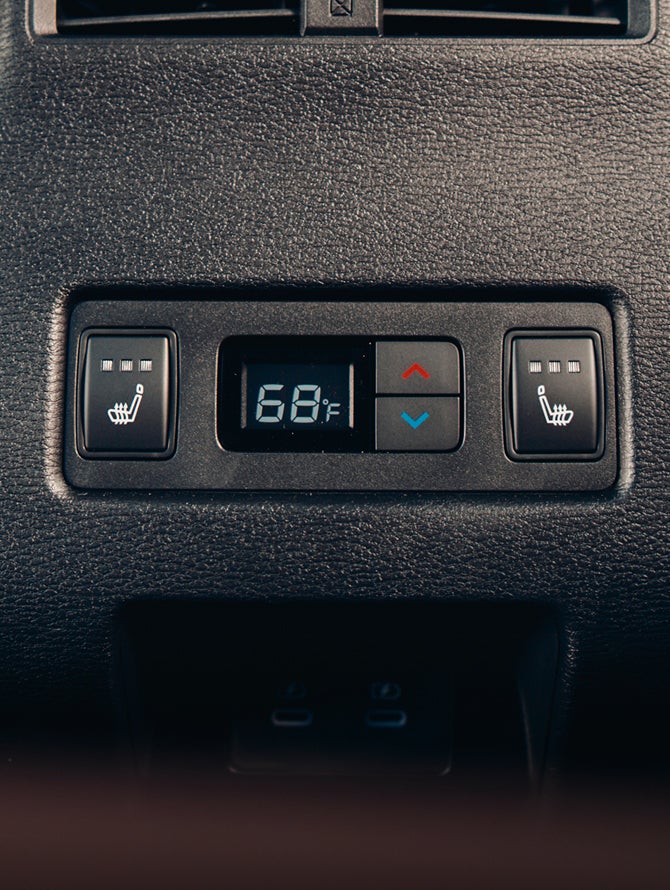 Close up of controls for heated back seats in the 2026 Mitsubishi Outlander SUV