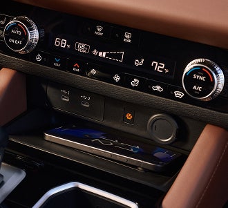 Close up off the wireless charging station in the 2026 Mitsubishi Outlander SUV