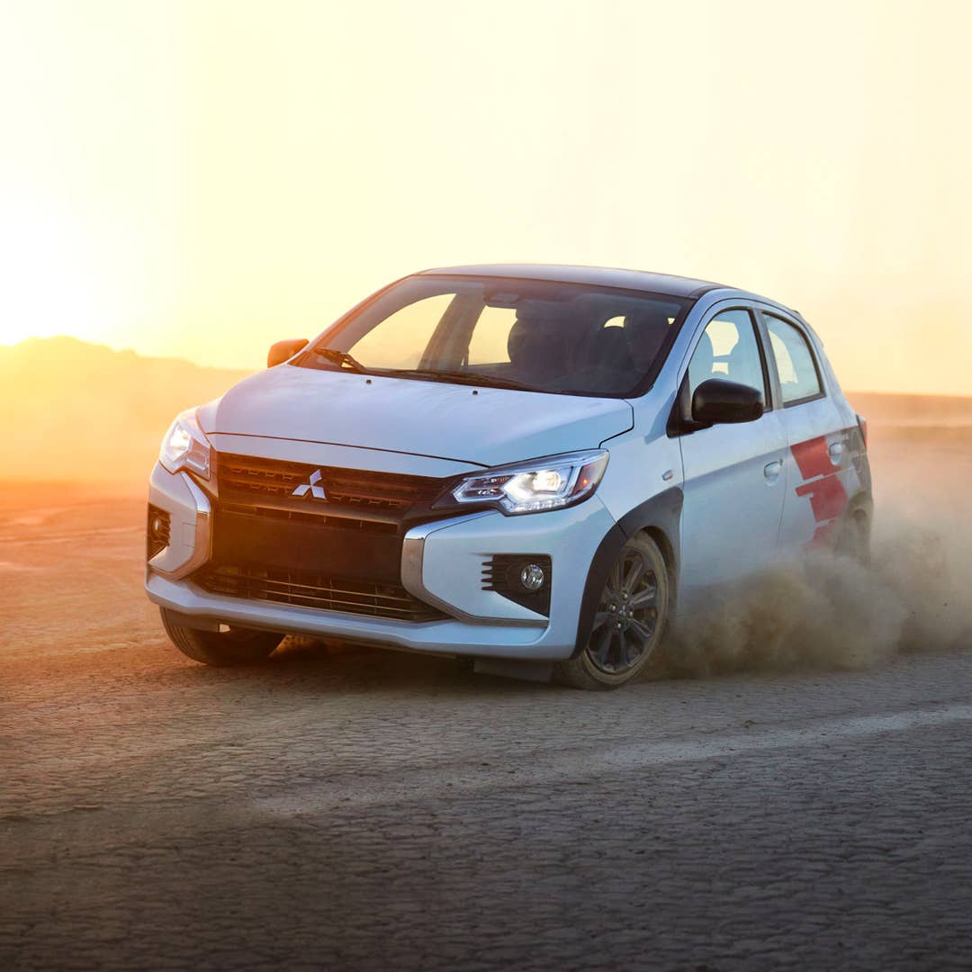 Angled view of a 2023 Mitsubishi Ralliart Edition Mirage hatchback in the desert